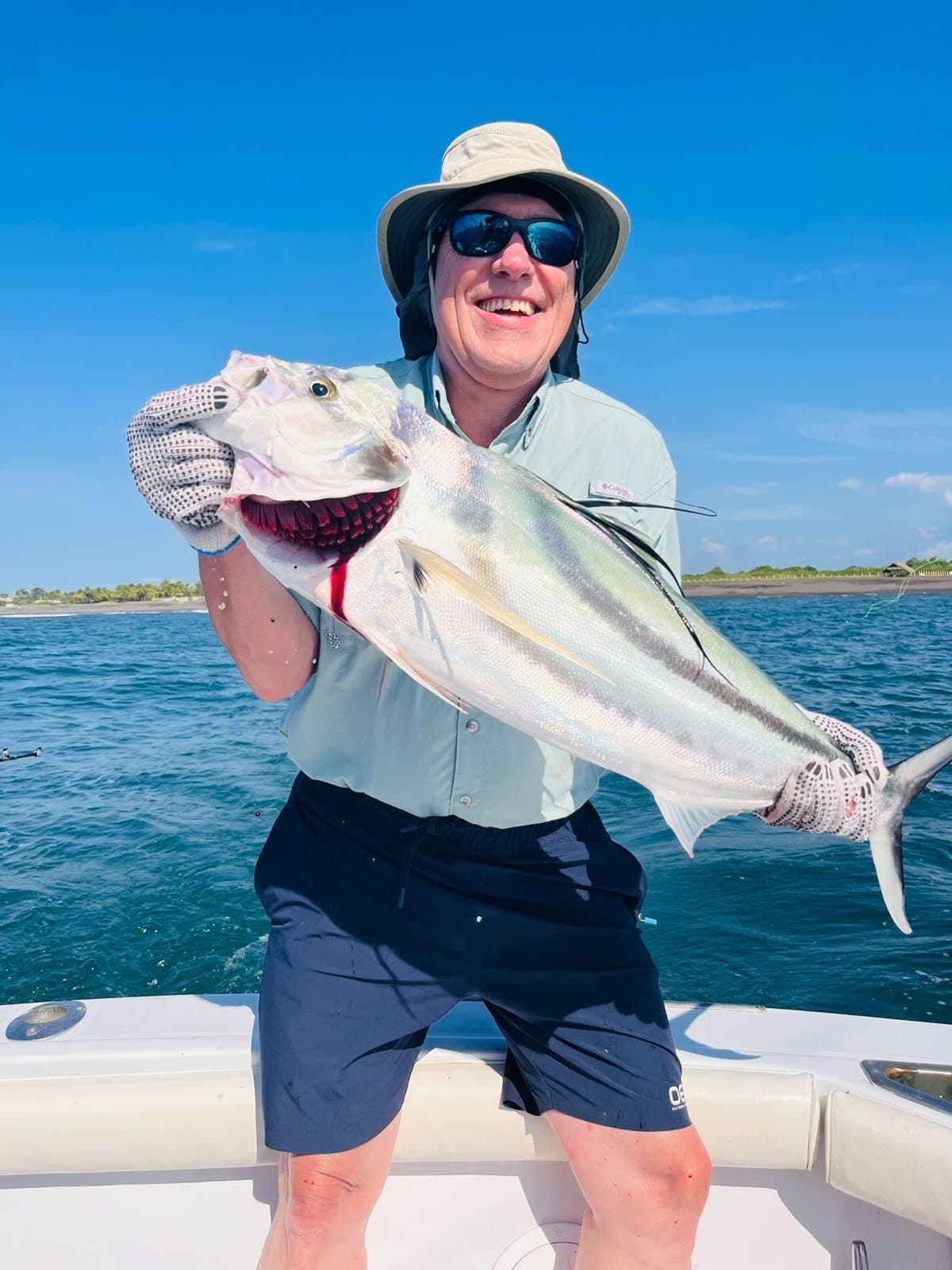A roosterfish held boatside on a Big Buoys charter off Puerto San José, Guatemala