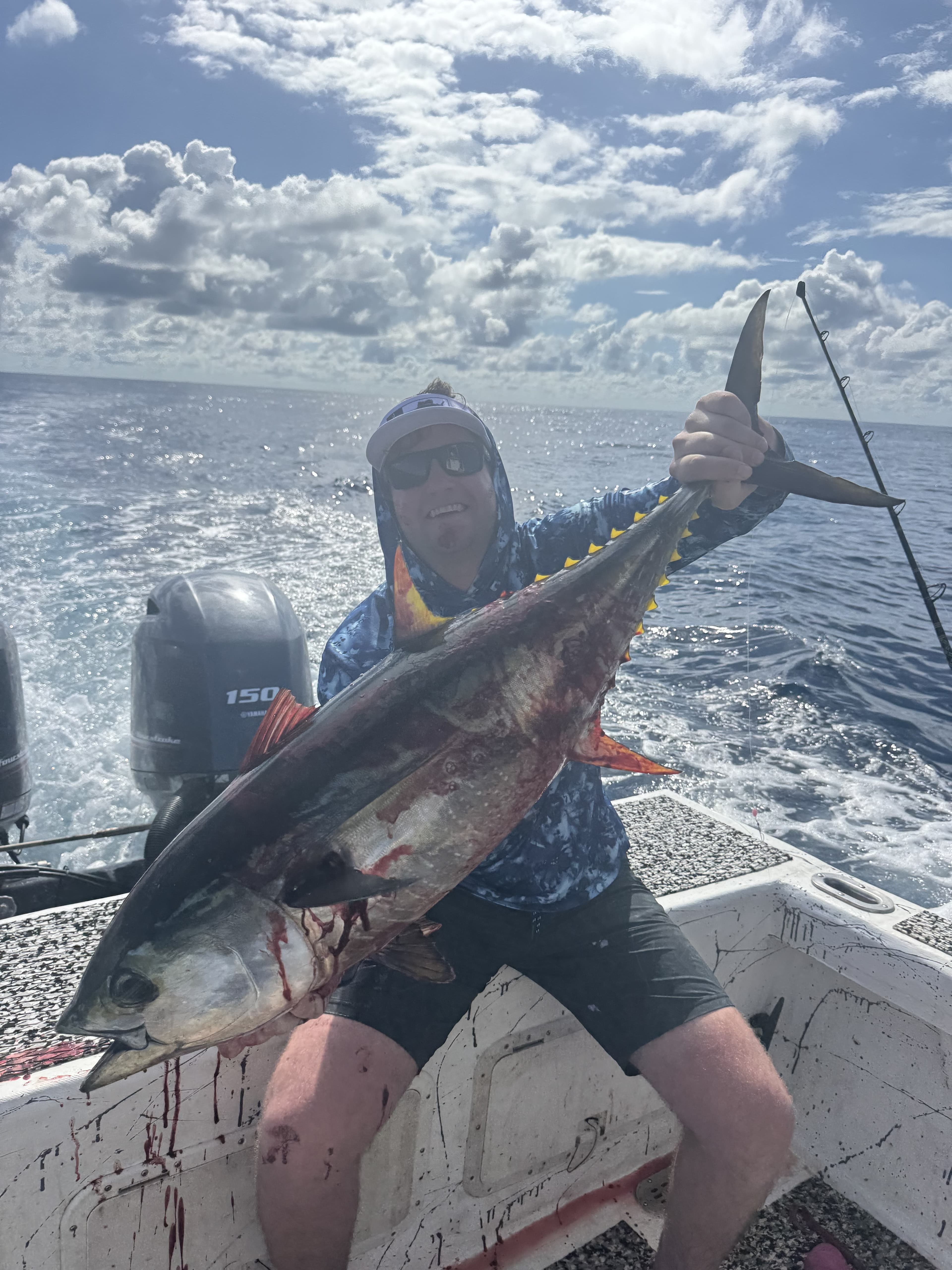 Caden Hawkinson, The Big Buoys owner and host, with a yellowfin tuna